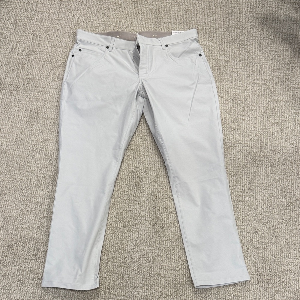 NWT Nike Light Gray Slim-Fit Performance Pants. Size 36x30